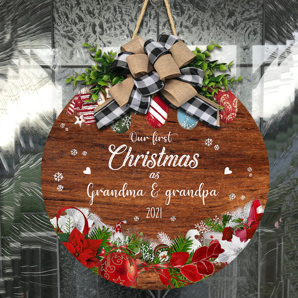 Gift For Grandma & Grandpa Our First Christmas Door Hanger - Nt