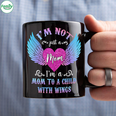 I'm a mom to a child with wings Mugs